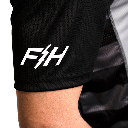 Load image into Gallery viewer, Fasthouse Youth Classic Velocity Short Sleeve Jersey - Silver/Indigo
