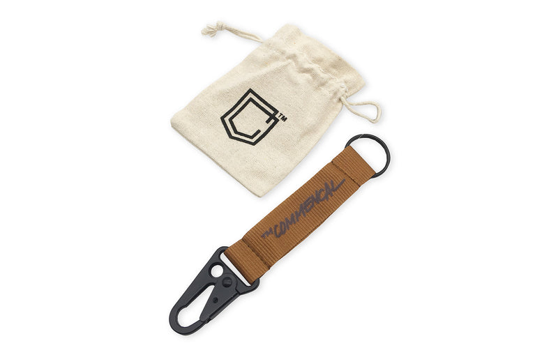 Load image into Gallery viewer, Commencal Carabiner Keychain - Brown
